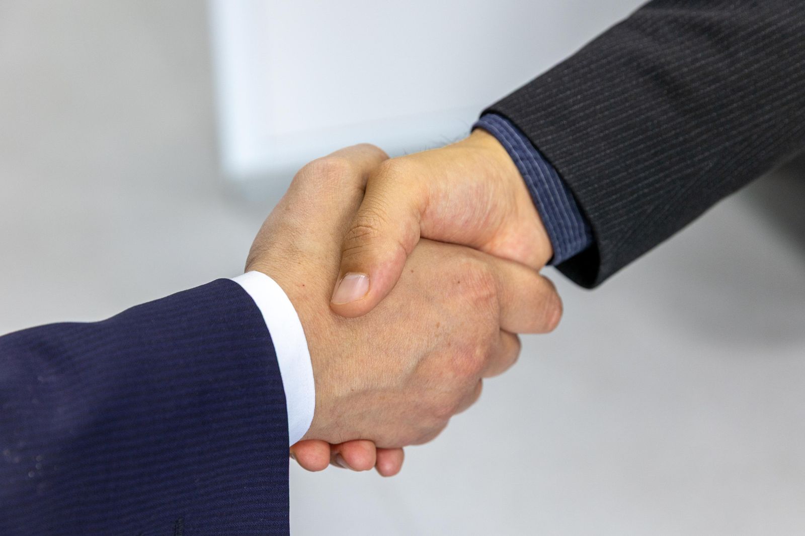 Shaking hands on a completed handover